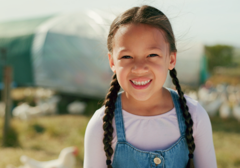 girl in poultry farm